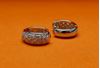 Picture of “Pavé” huggies, hinged earrings in sterling silver inlaid with round cubic zirconia on the front side