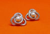 Image de « Perle sur nœud d'amour » ensemble de pendentif et clous d'oreilles en argent sterling, une seule perle d'eau douce encadrée par un nœud d'amour de zircones cubiques rondes