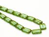 Picture of 12x8 mm, flat rectangular Czech beads, light peridot green, transparent, picasso