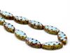 Picture of 18x7 mm, carved, flat spindle-shaped Czech beads, turquoise opal blue, opaque, picasso, 6 pieces