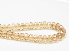 Picture of 4x7 mm, Czech faceted rondelle beads, transparent, champagne beige luster