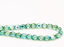 Picture of 6x6 mm, Czech faceted round beads, transparent, light emerald green luster, shimmering