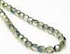 Picture of 6x6 mm, Czech faceted round beads, transparent, variegated muted green and blue luster
