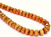 Picture of 6x8 mm, Czech faceted rondelle beads, opal topaz brown, translucent, travertine