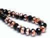 Picture of 6x9 mm, Czech faceted rondelle beads, black, opaque, half tone rose golden mirror