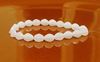 Picture of 5x3 mm, Pinch beads, Czech glass, alabaster white, translucent