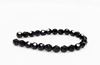 Picture of 4x4 mm, Czech faceted round beads, black, opaque, glossy finishing
