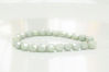 Image de 4x4 mm, perles à facettes tchèques rondes, blanc craie, opaque, lustré vert céladon pâle