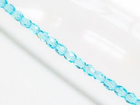 Picture of 4x4 mm, Czech faceted round beads, Swiss blue, transparent