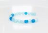 Picture of 4x4 mm, Czech faceted round beads, translucent, opal blue and blue