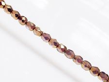 Picture of 4x4 mm, Czech faceted round beads, transparent, golden luster