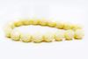 Picture of 6x6 mm, Czech faceted round beads, corn silk white, opaque