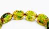 Picture of 14x11x5 mm, Czech druk beads, puffy oval, variegated crystal and moss green, transparent, picasso comma dashes