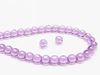 Picture of 6x6 mm, round, Czech druk beads, heliotrope purple-pink, transparent, shimmering