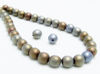 Picture of 6x6 mm, round, Czech druk beads, black, opaque, bleu brown iris, matte