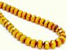 Picture of 6x8 mm, Czech faceted rondelle beads, warm opal yellow, translucent, travertine