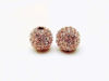 Picture of 10x10 mm, round, alloy beads, rose gold-plated, clear pavé crystals, 2 pieces