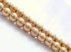 Picture of 6x6 mm, round, Czech druk beads, alabaster white, translucent, satin golden finishing, pre-strung, 64 beads