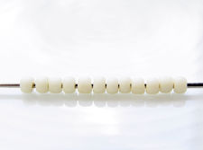 Picture of Japanese seed beads, round, size 11/0, Toho, opaque luster, pastel eggshell off-white, frosted
