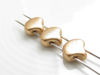 Picture of 7.5x7.5 mm, fan-shaped beads, Ginkgo leaf, Czech glass, 2 holes, metallic, flax or pale gold, matte