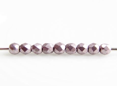 Picture of 2x2 mm, Czech beads, a soup of different round shapes, almost mauve or silvery mauve, opaque, saturated metallic