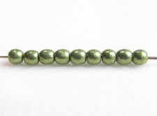 Picture of 2x2 mm, round, Czech druk beads, fern green, opaque, sueded gold