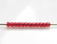 Picture of Japanese seed beads, round, size 11/0, Toho, silver-lined, milky pomegranate red