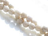 Picture of 6x6 mm, round, gemstone beads, river stone, antique white, natural