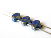 Picture of 7.5x7.5 mm, fan-shaped beads, Ginkgo leaf, Czech glass, 2 holes, opaque, blue, Rembrandt finishing