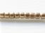Afbeeldingen van Tsjechische cilinder rocailles, maat 10, metaalkleur, vlas of licht goud, mat, 5 gram